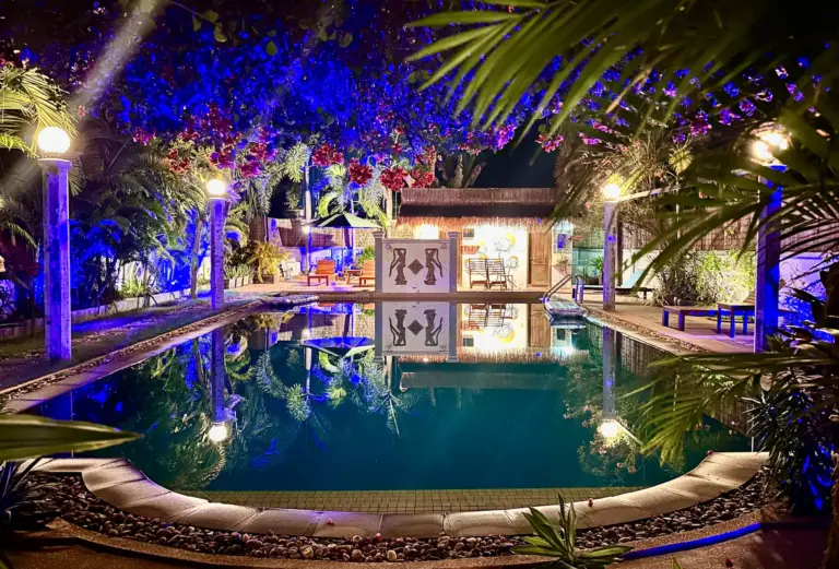 Night shot of well light salt water swimming pool at Saralya House in Siem Reap, Cambodia.